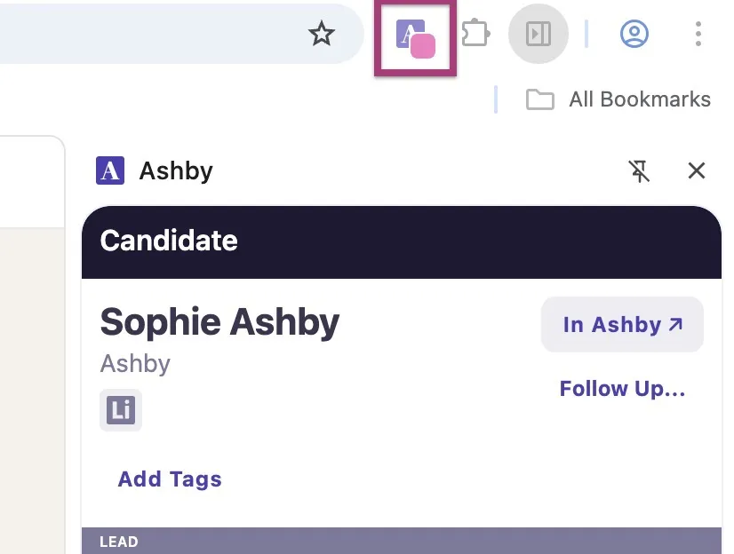 The screenshot shows the pink indicator on the Ashby Chrome extension icon. The screenshot shows the pink indicator on the Ashby Chrome extension icon.