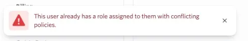 Error message stating, “This user already has a role assigned to them with conflicting policies.”