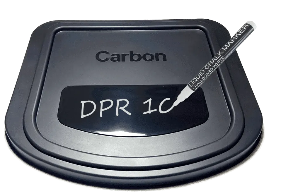 Chalk marker writing on the shiny surface of the cassette lid