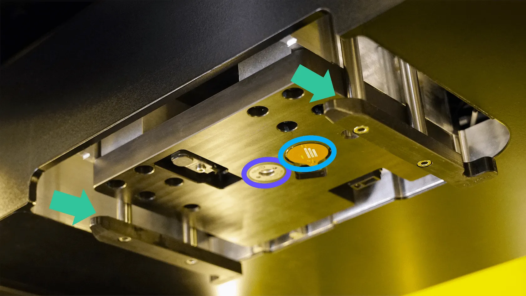 Underside of bridge showing guide rails, print head clamp pot and platform NFC antenna.