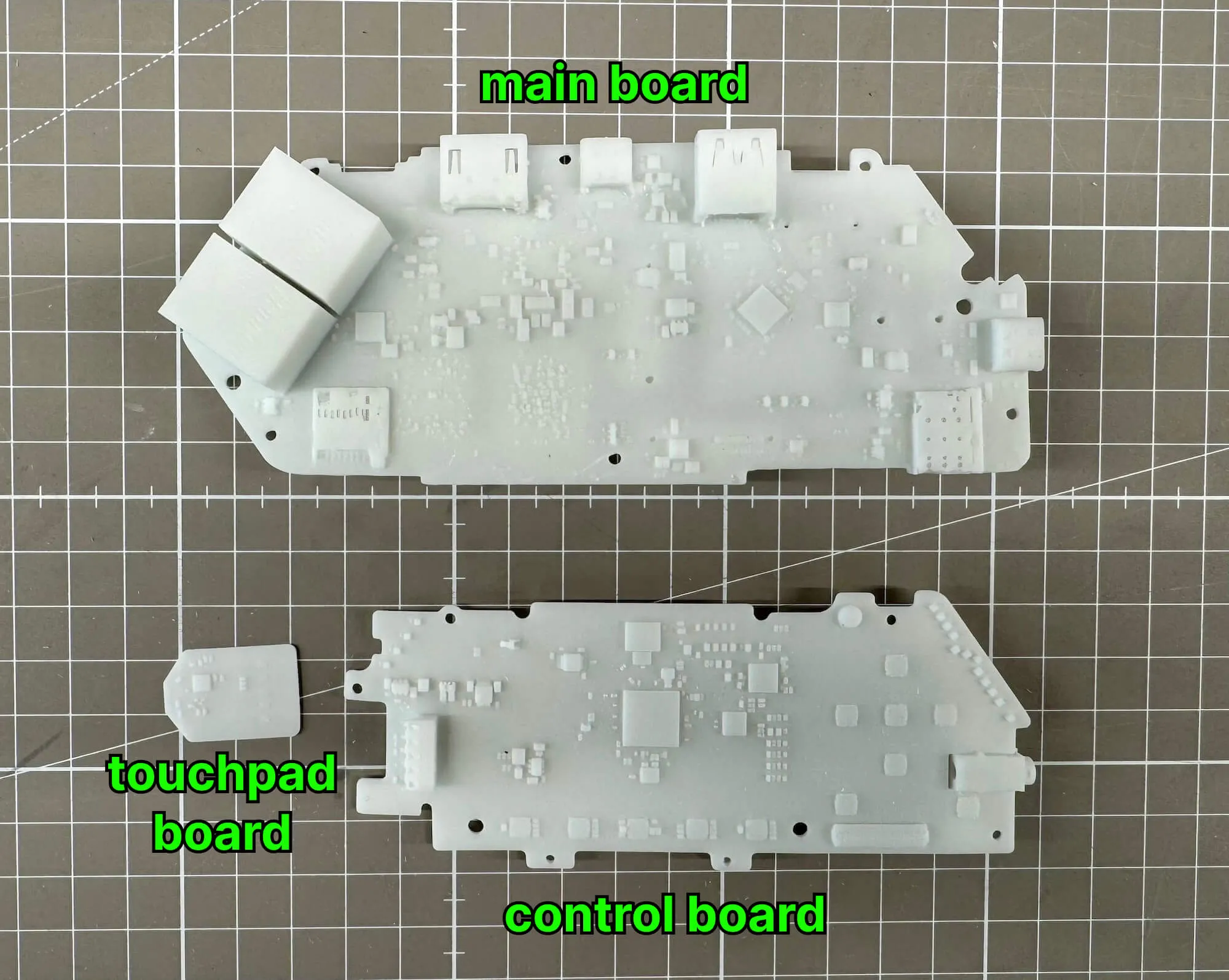 3d-printed models of PCBs: main, touchpad, and control board