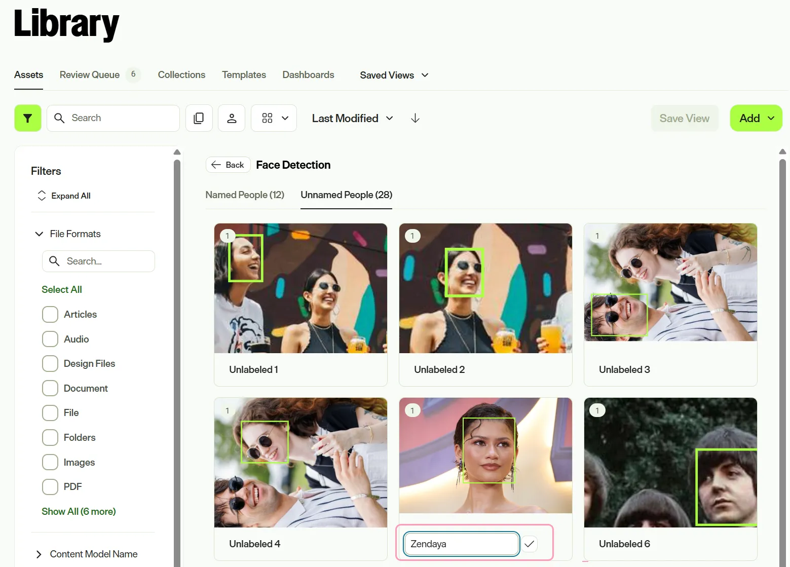 Screenshot of the Unnamed People tab where a name is entered below a detected face