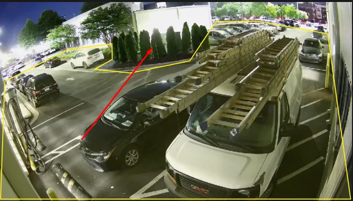 An example of where a missed detection can occur if the alarm zone is drawn on top of large objects.